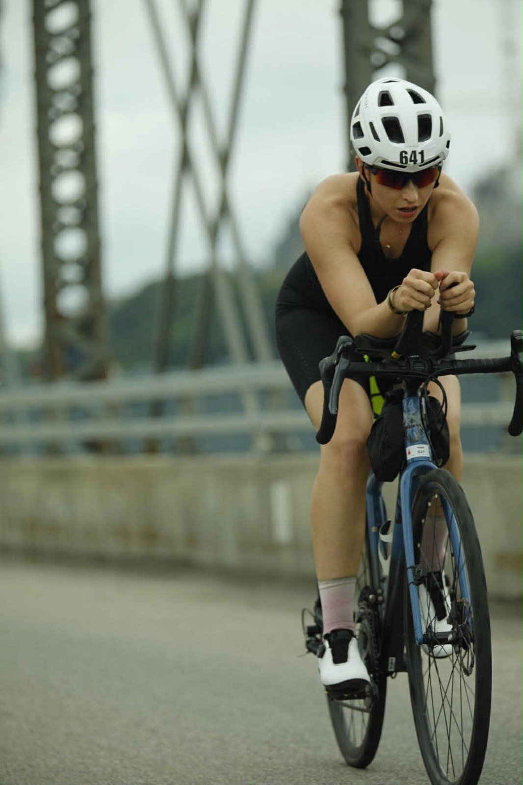 Océane riding her triathlon bike during the Ottawa IRONMAN